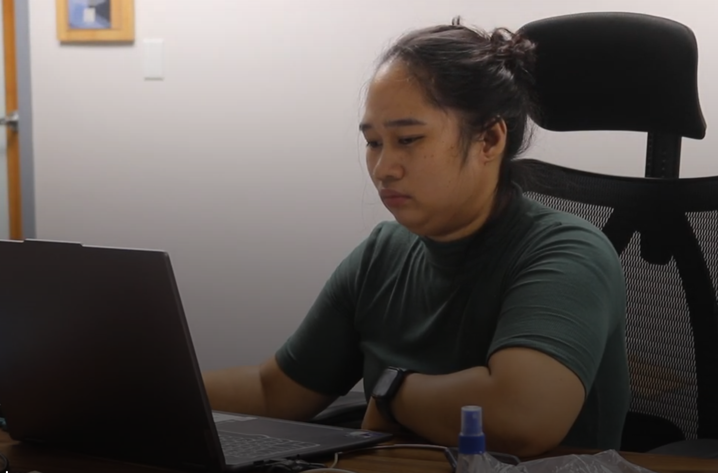 Computer Worker Image of an office worker typing on a laptop